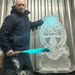 Princess of Wales' Royal Regiment Cap Badge ice sculpture vodka luge for dine out.